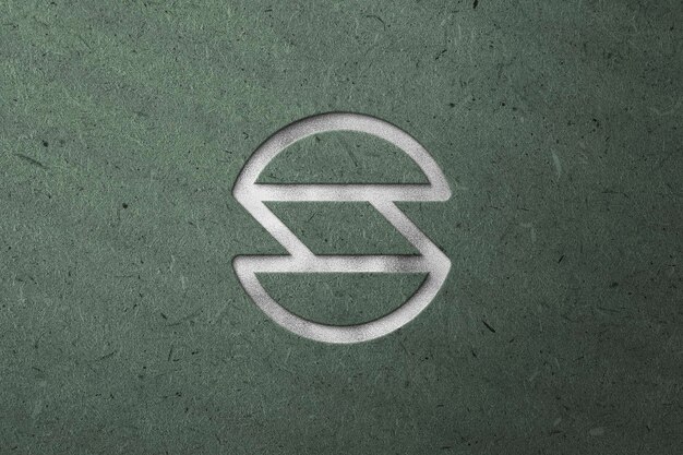Silver Logo Mockup with Debossed Effect on Green paper Texture