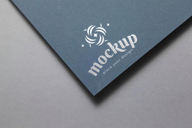Silver logo on paper