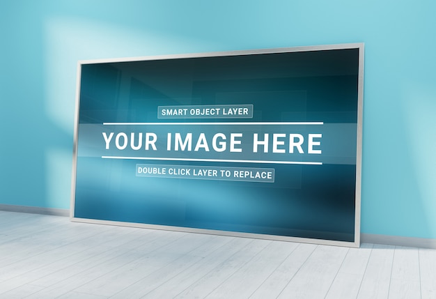 Silver photo frame leaning in blue interior Mockup