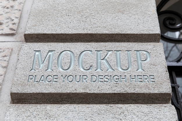 PSD silver text on stone mockup design