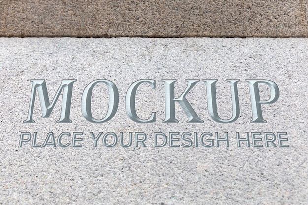 PSD silver text on stone mockup design