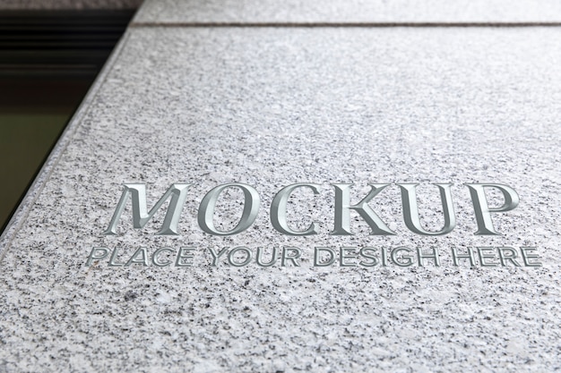 PSD silver text on stone mockup design