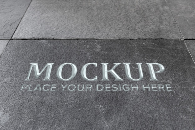 PSD silver text on stone mockup design