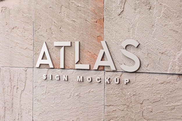 PSD silver text on stone mockup design