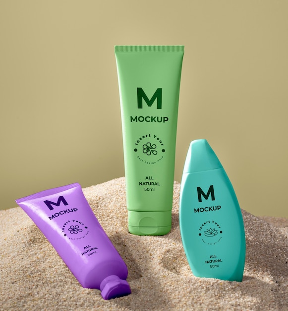 Skincare products printed in sand mockup