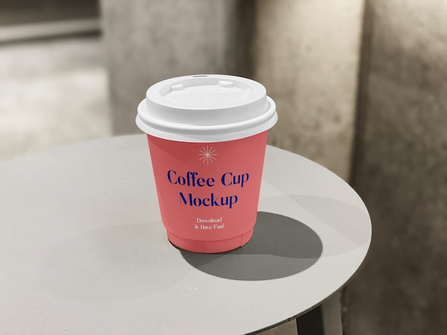 PSD small coffee cup on table mockup