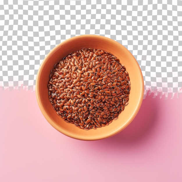 A small orange bowl with rice and a black and white checkered background