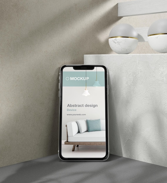 石と金属の要素を備えたスマートフォンのモックアップアレンジメント