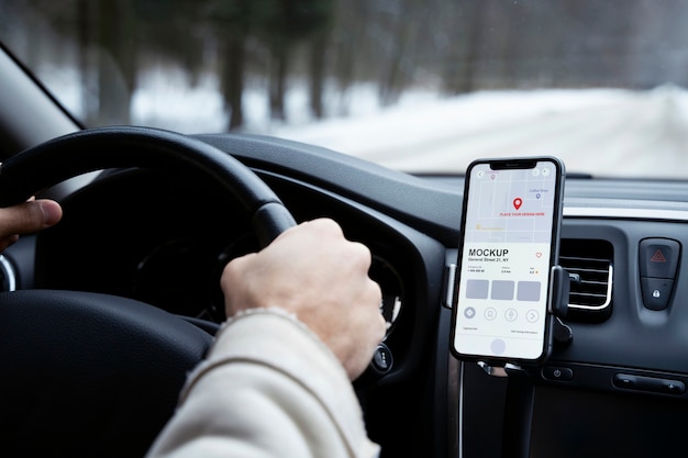 Smartphone mock-up inside car during winter trip