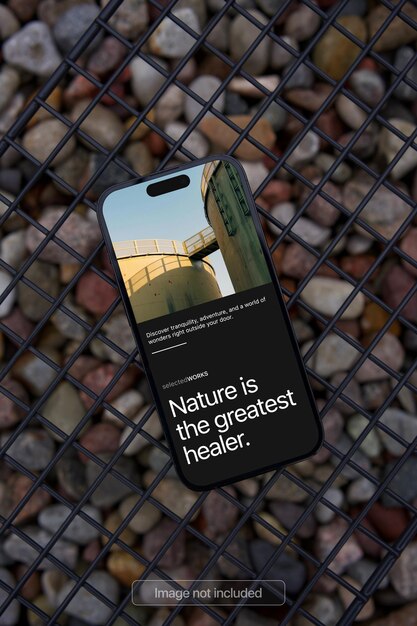 Smartphone mockup on a natural background with many stones