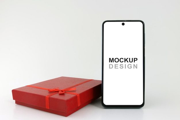 Confezione regalo rossa per smartphone mockup