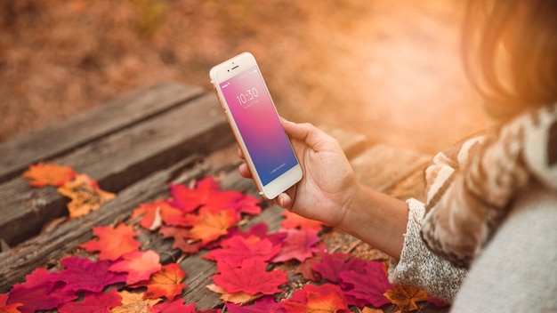 PSD smartphone mockup with autumn concept