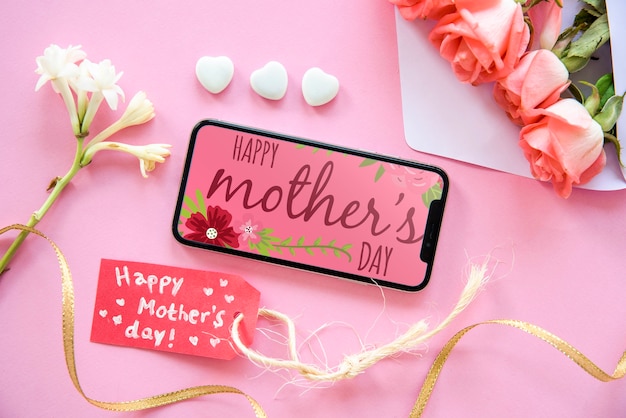 PSD smartphone mockup with flat lay mothers day composition