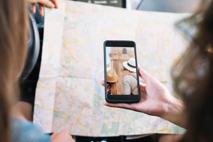 PSD smartphone mockup with girls looking at map