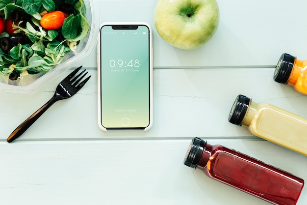 PSD smartphone mockup with healthy food