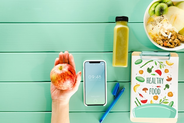 PSD smartphone mockup with healthy food