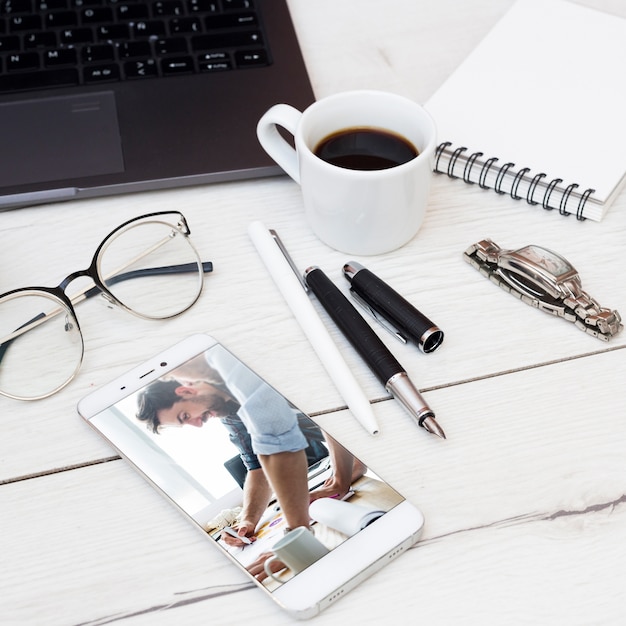 PSD smartphone mockup with office elements