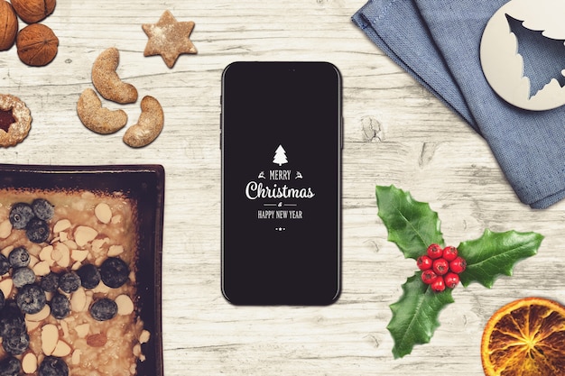 Smartphone screen mockup with christmas design