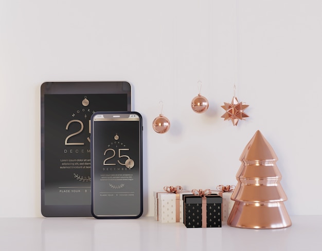 Smartphone and tablet mockup with christmas decoration