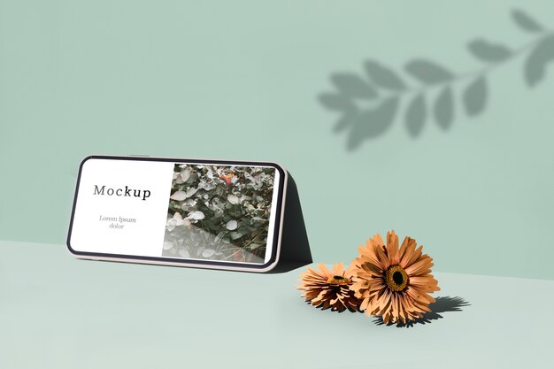 PSD smartphone con ombra e fiori