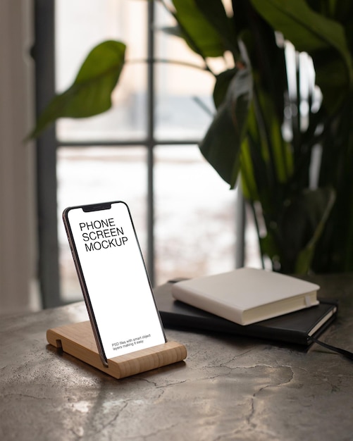 smartphone with wooden holder