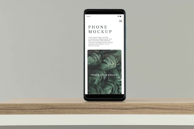 PSD smartphone on wooden table mocku[