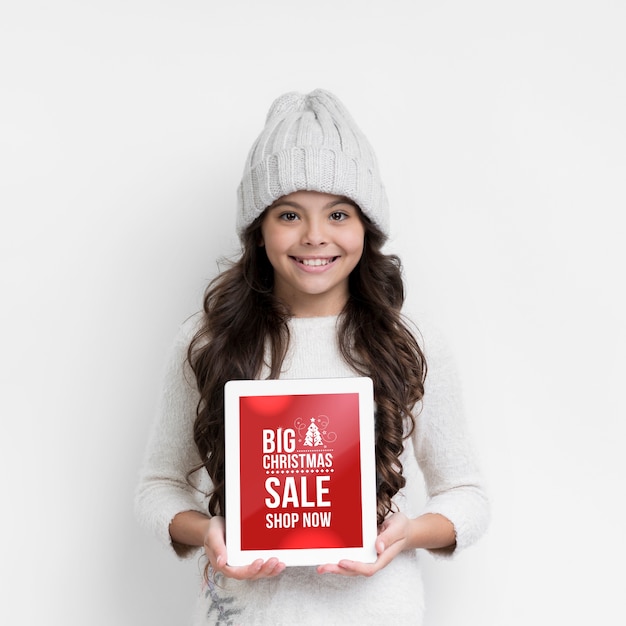 PSD smiley girl with paper sheet for winter sales