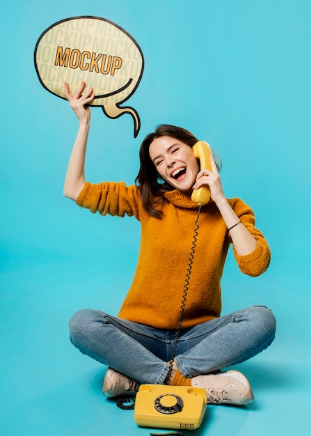 PSD smiley woman with chat bubble and old phone