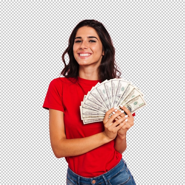 Smiling brunette woman holding money in hands and looking at the camera over pink