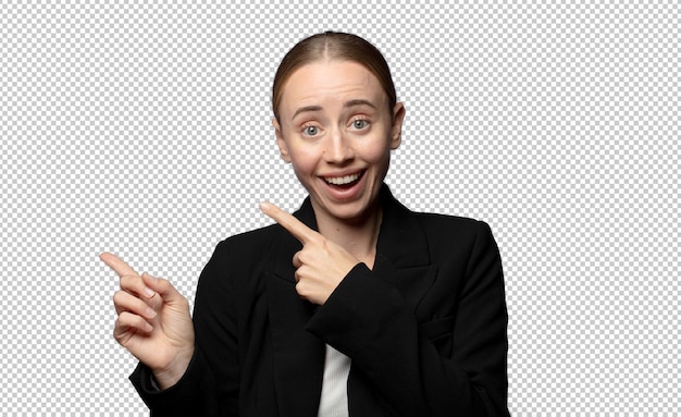 smiling cheerfully and pointing to copy space on palm on the side showing or advertising an object