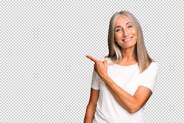 smiling cheerfully feeling happy and pointing to the side