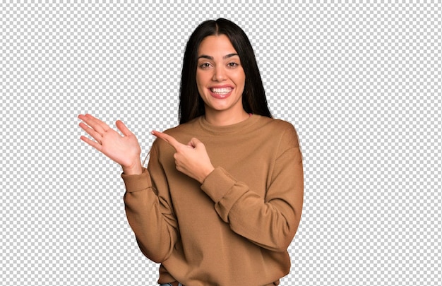 PSD smiling cheerfully and pointing to copy space on palm on the side showing or advertising an object
