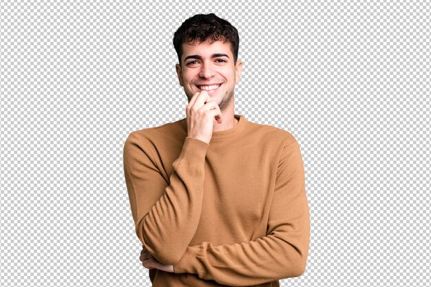 Smiling enjoying life feeling happy friendly satisfied and carefree with hand on chin