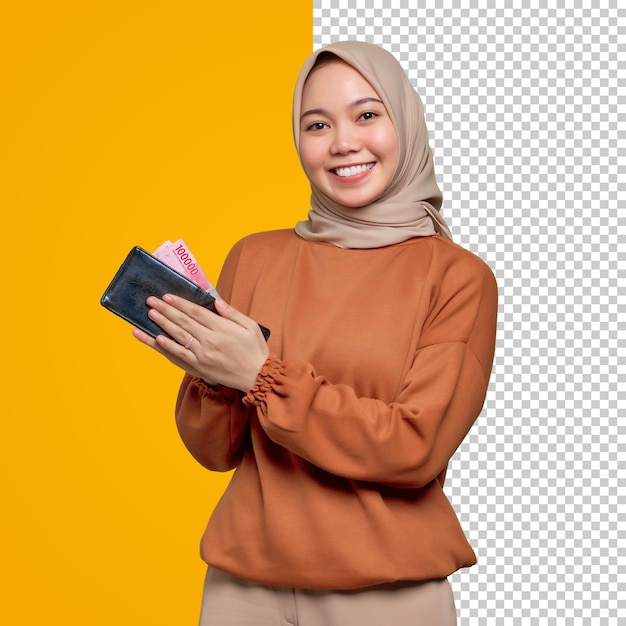 Smiling young asian woman in orange shirt showing wallet full of money banknotes