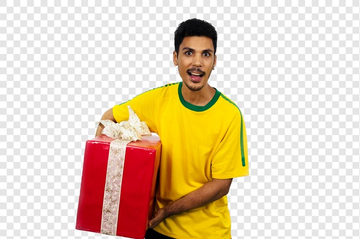 PSD soccer brazilian fan celebrates holding a red gift isolated