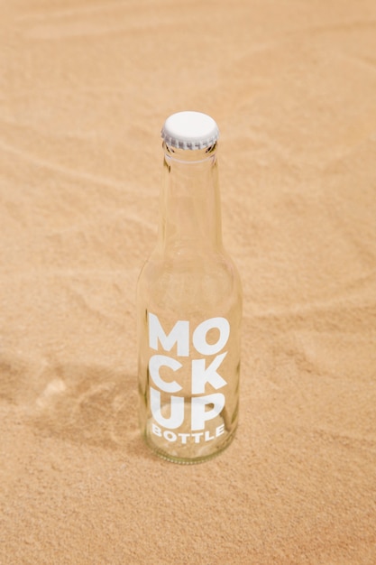Soda bottle on the beach mockup