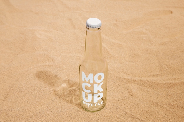 Soda bottle on the beach mockup
