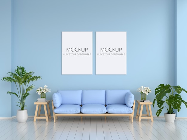 Sofa and plant in blue living room with frames mockup