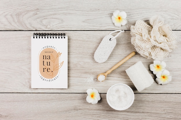 Spa treatment and care accessories mock-up with flowers