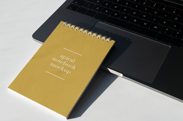 PSD spiral notebook mockup on office table