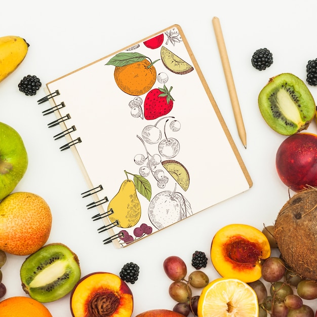 Spiral notebook mockup with fruits