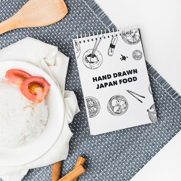 PSD spiral notepad mockup with japanese food mockup