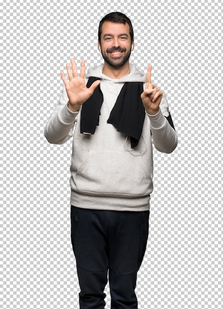 Sport man counting six with fingers