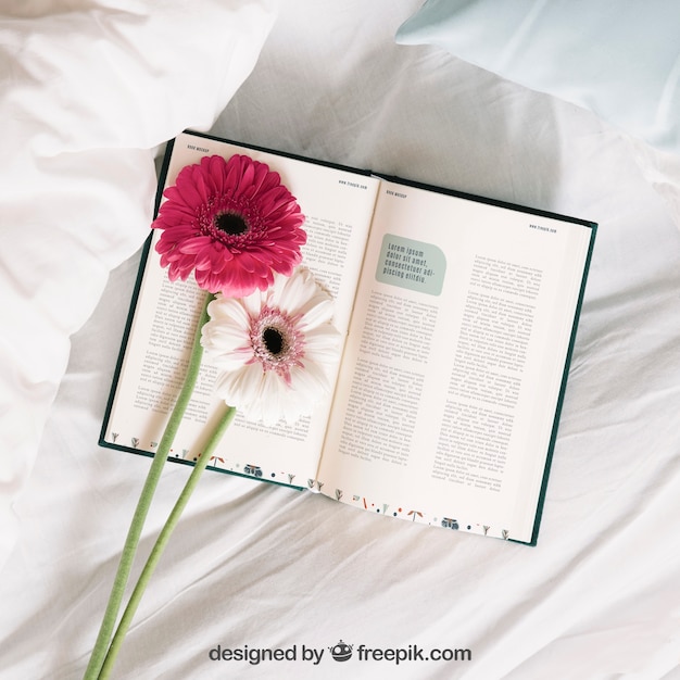 Spring concept mockup with flowers in book