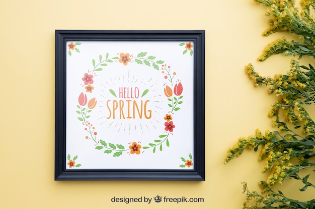 PSD spring mock-up met frame en wilde bloemen aan de rechterkant