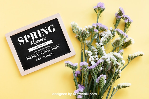 PSD spring mock up with slate next to flowers