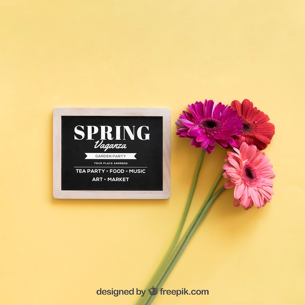 PSD spring mock up with slate and three flowers