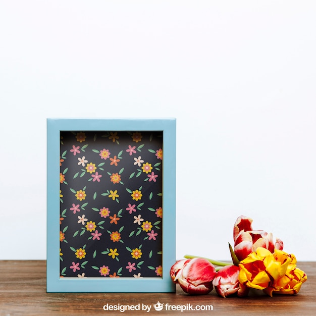 spring mockup with blue frame of flowers