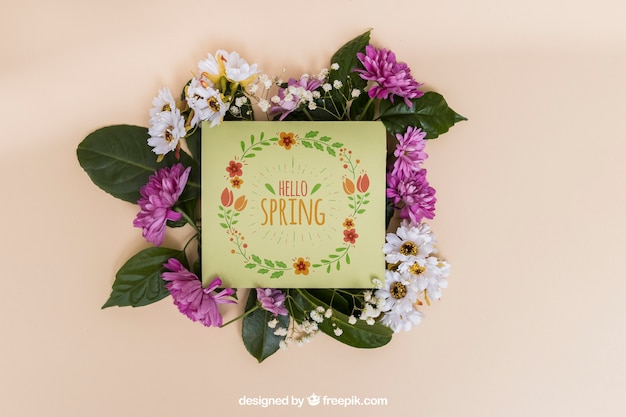 PSD spring mockup with card on flowers