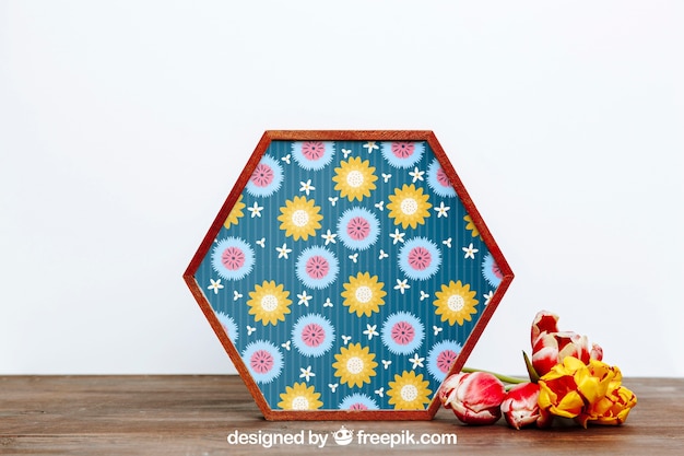 spring mockup with hexagonal frame of flowers